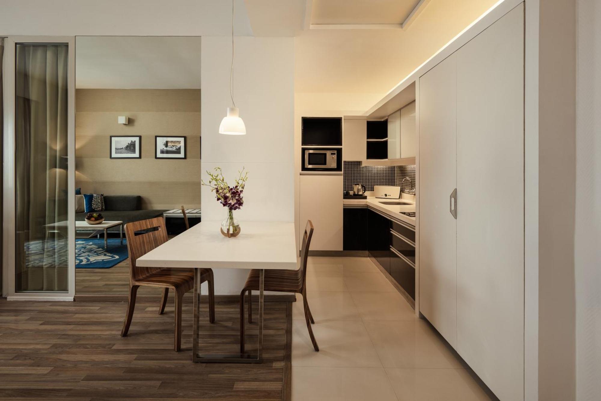 Executive Suite with Balcony with  Happy Hours with finger food, 4 pieces of laundry, High‑Speed Internet, Flexible check‑in and check‑out timings (subject to availability),1704911475:JPEG