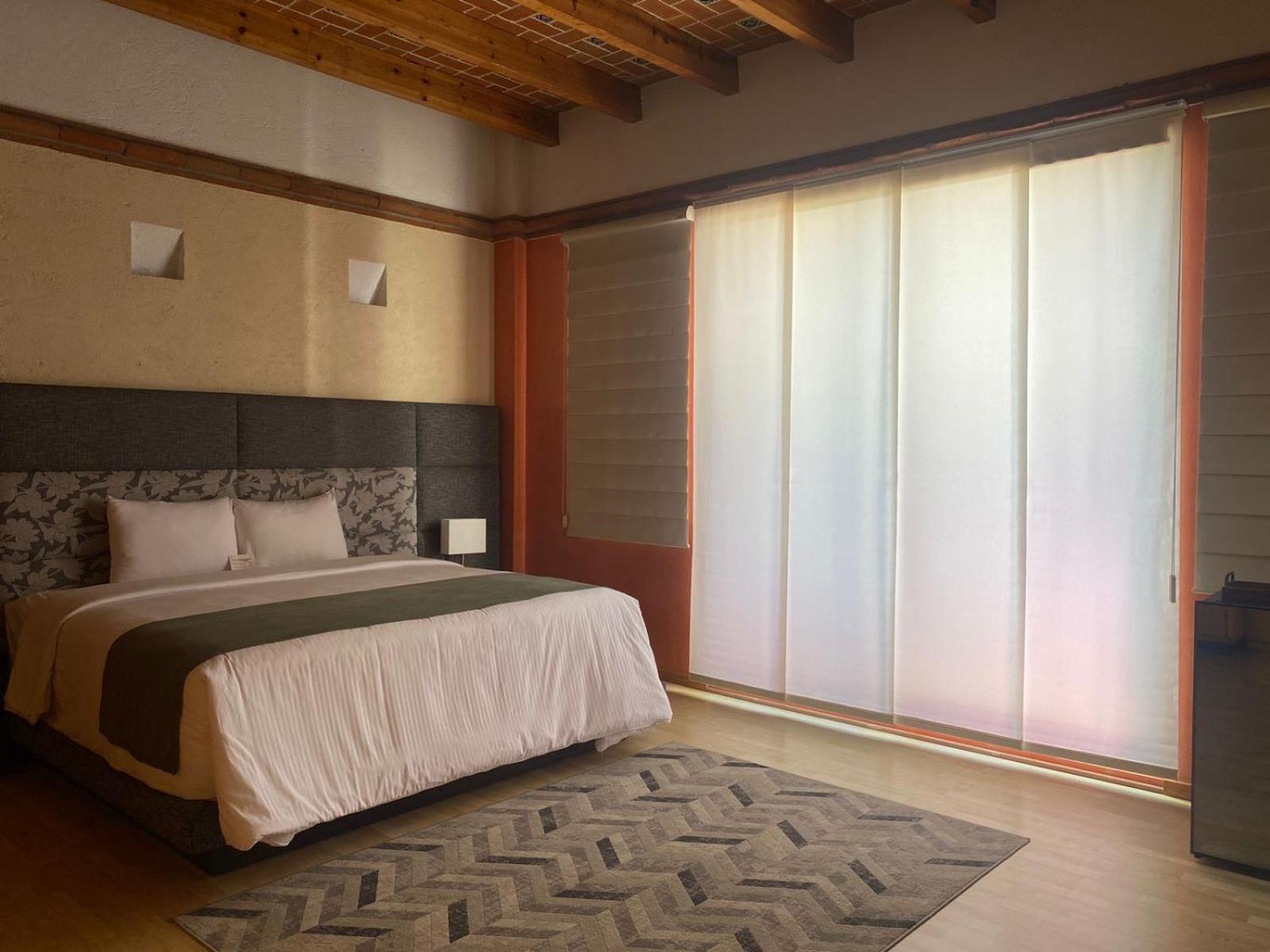 Suite con cama extragrande