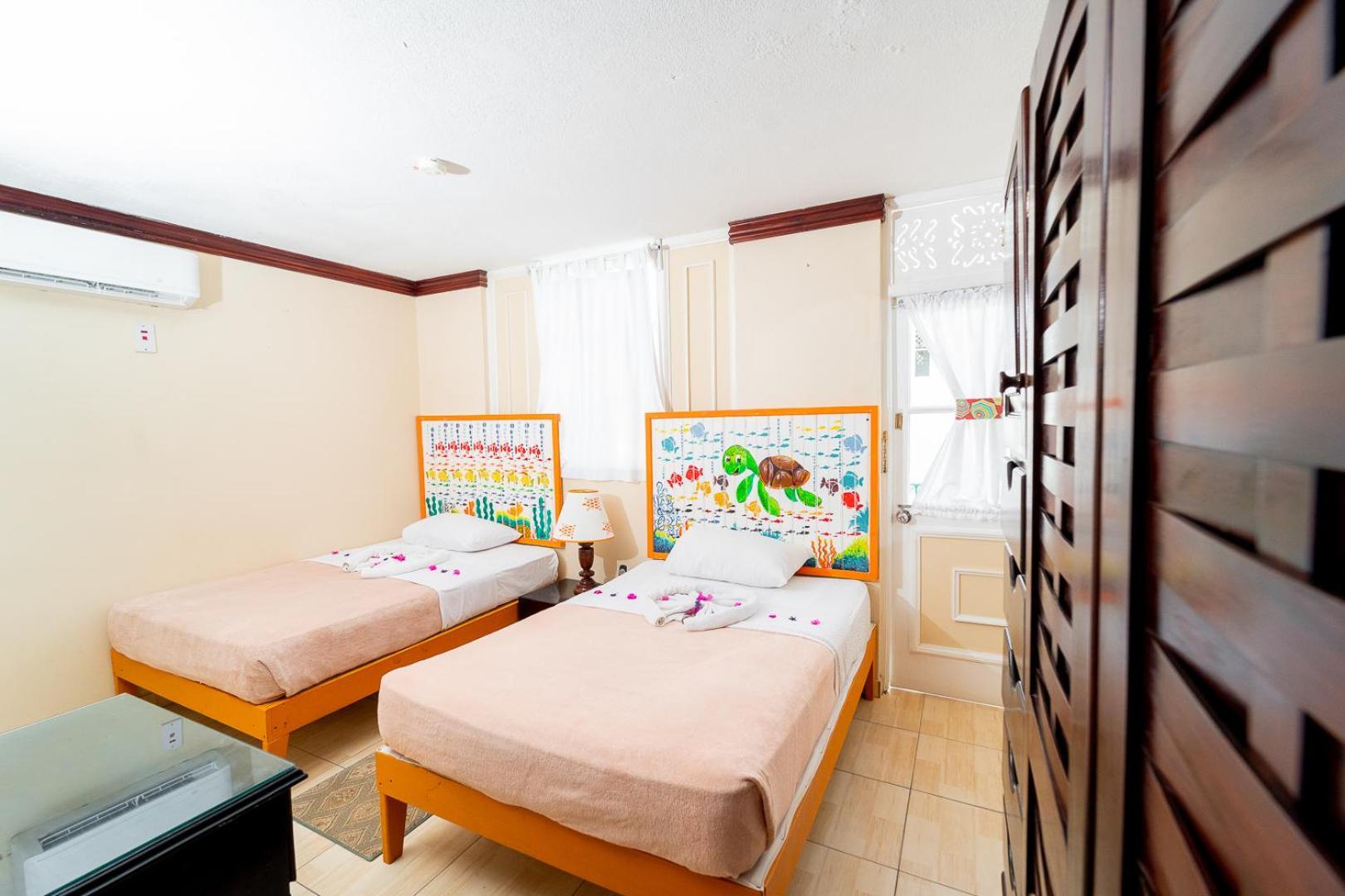 Two-Bedroom Junior Suite Garden or Pool View Nanny Service