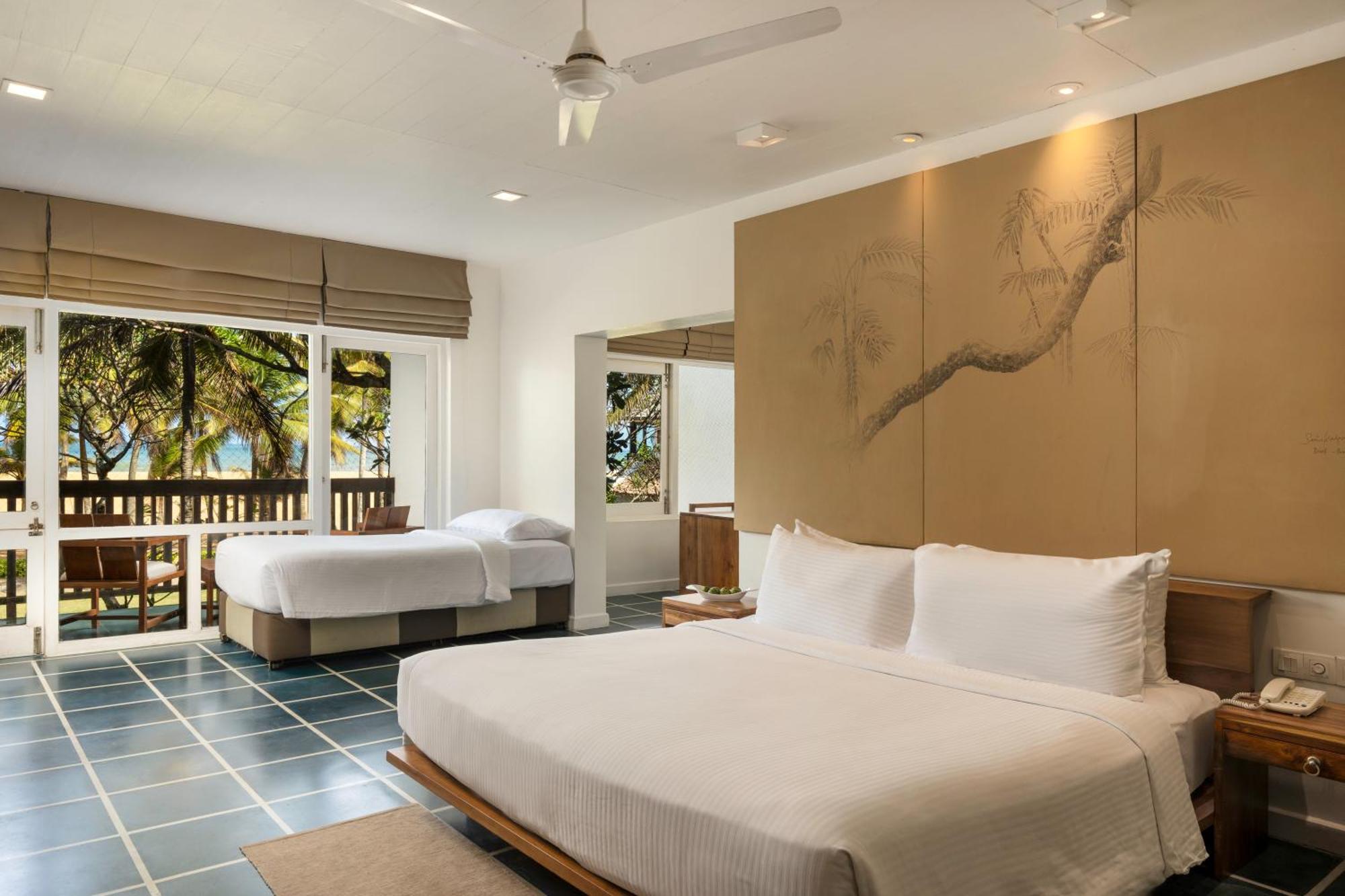 Family Room Sea View at Center Point Black Coral & at Seaside Social restaurants