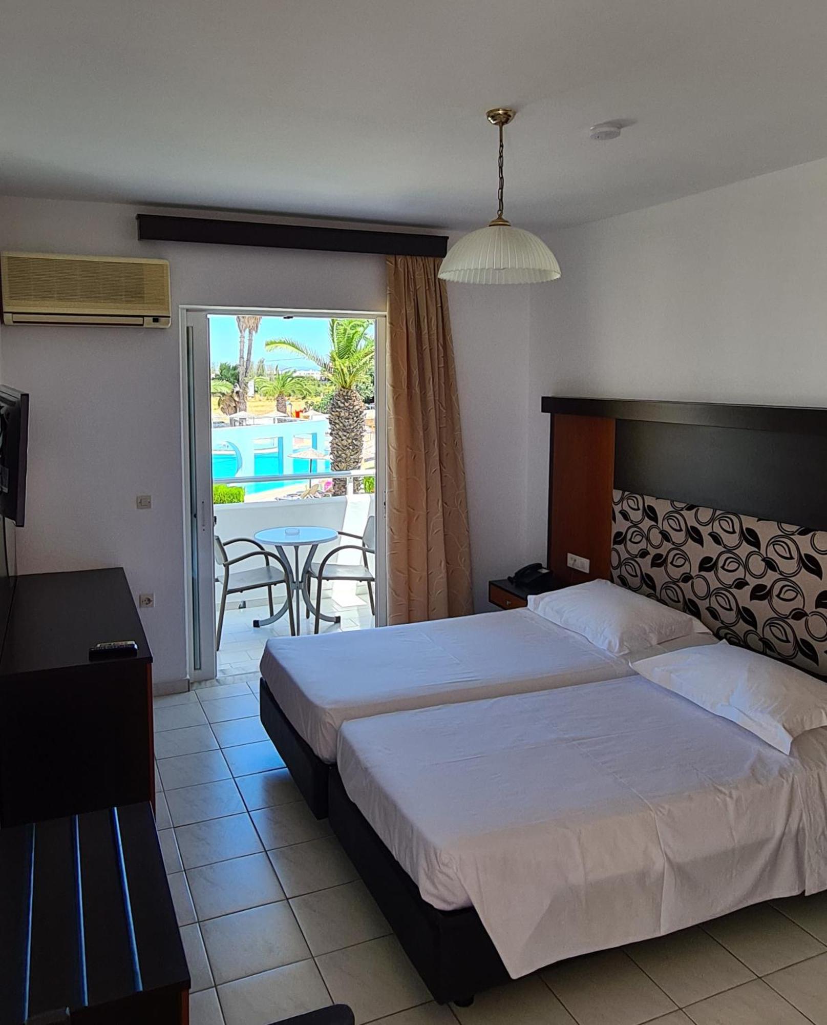 Double or Twin Room Pool View,1571305952:JPEG