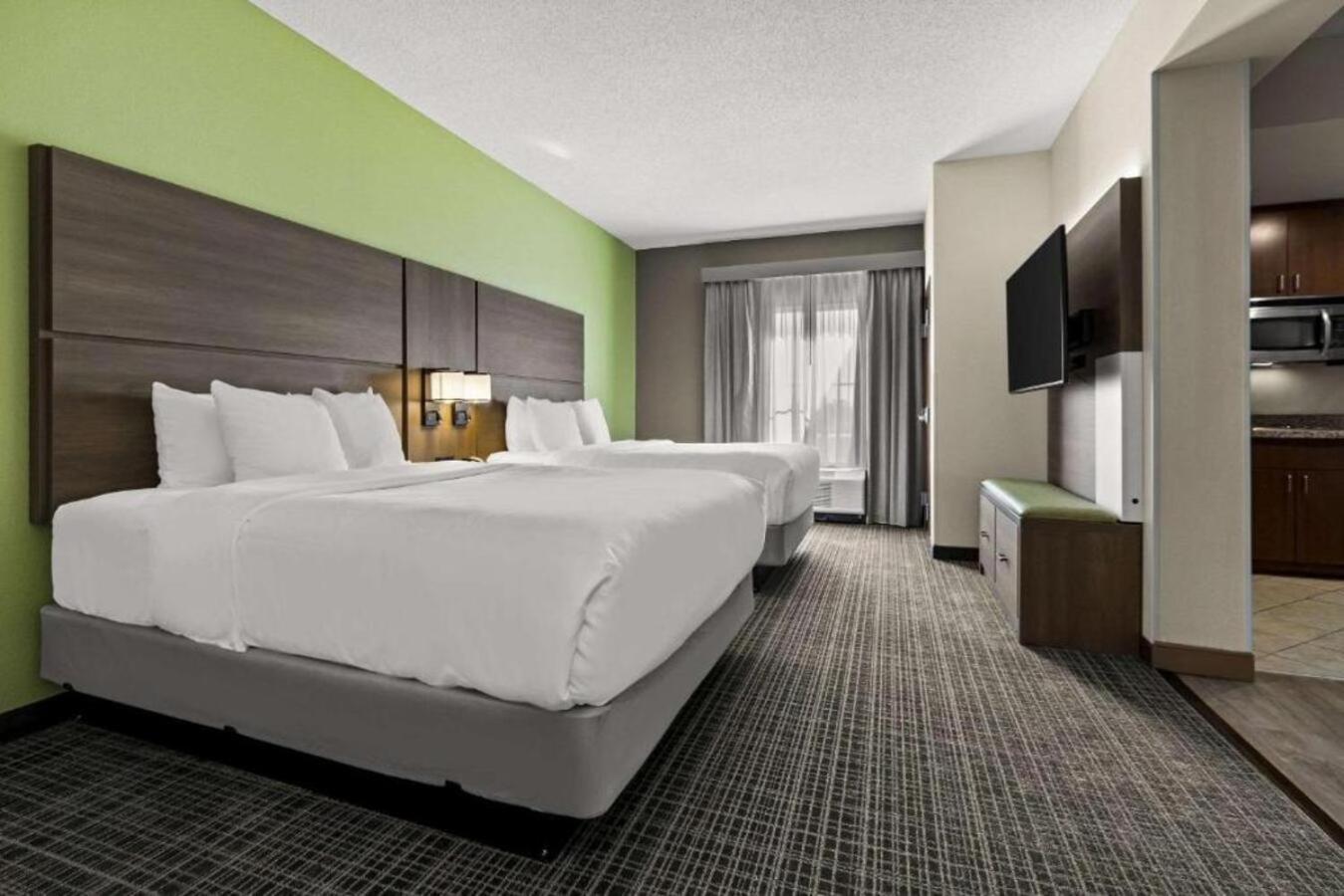 Efficiency Suite Two Queen Beds Sofabed Accessible Tub Accessible or Non-Smoking