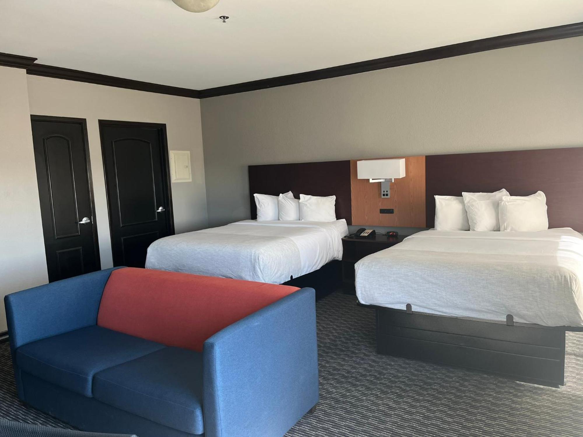 Queen Room with Two Queen Beds and Sofa Bed - Mobility Accessible - Roll-In Shower - Non-Smoking
