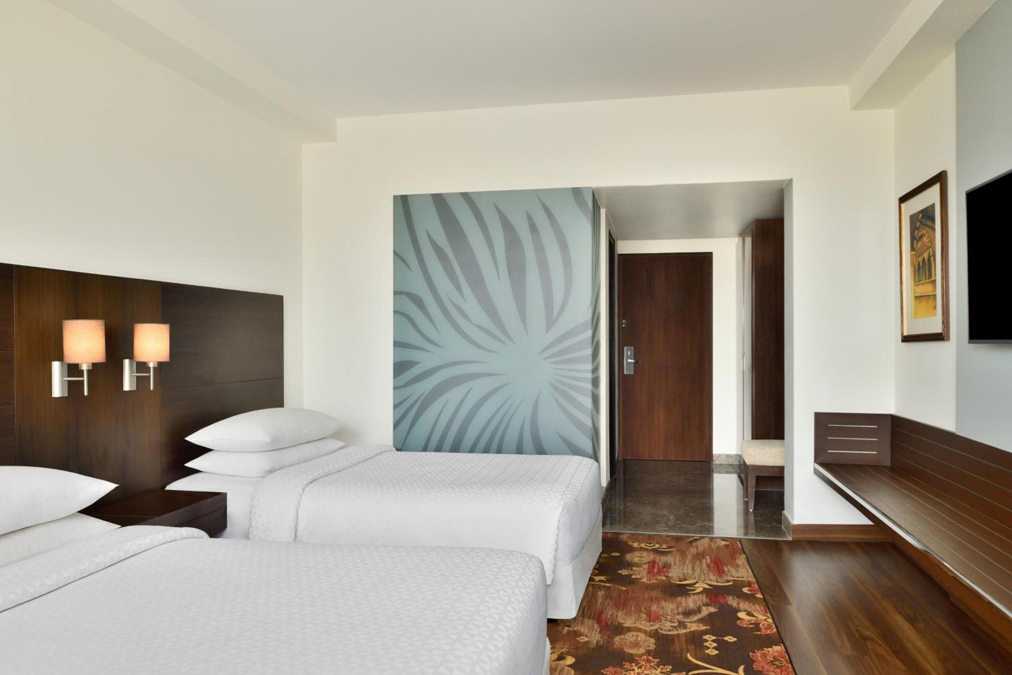 Deluxe Twin Room Dis on SPA Laundry Food & Soft Beverages only at The Eatery Credit Meal of INR 1000 or a the on bill amount of INR 2500 or