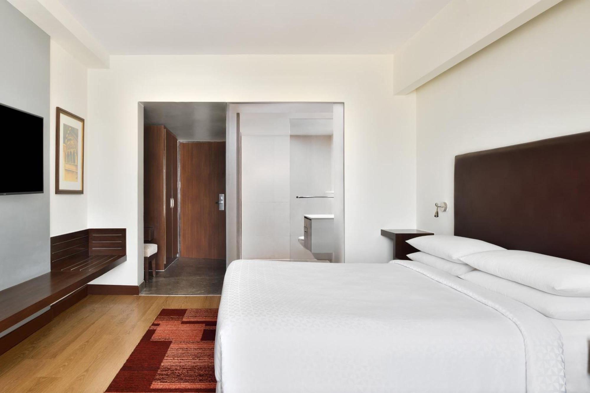 Deluxe King Guest Room Dis on SPA Laundry Food & Soft Beverages only at The Eatery Credit Meal of INR 1000 or a the on bill amount of INR 2500 or