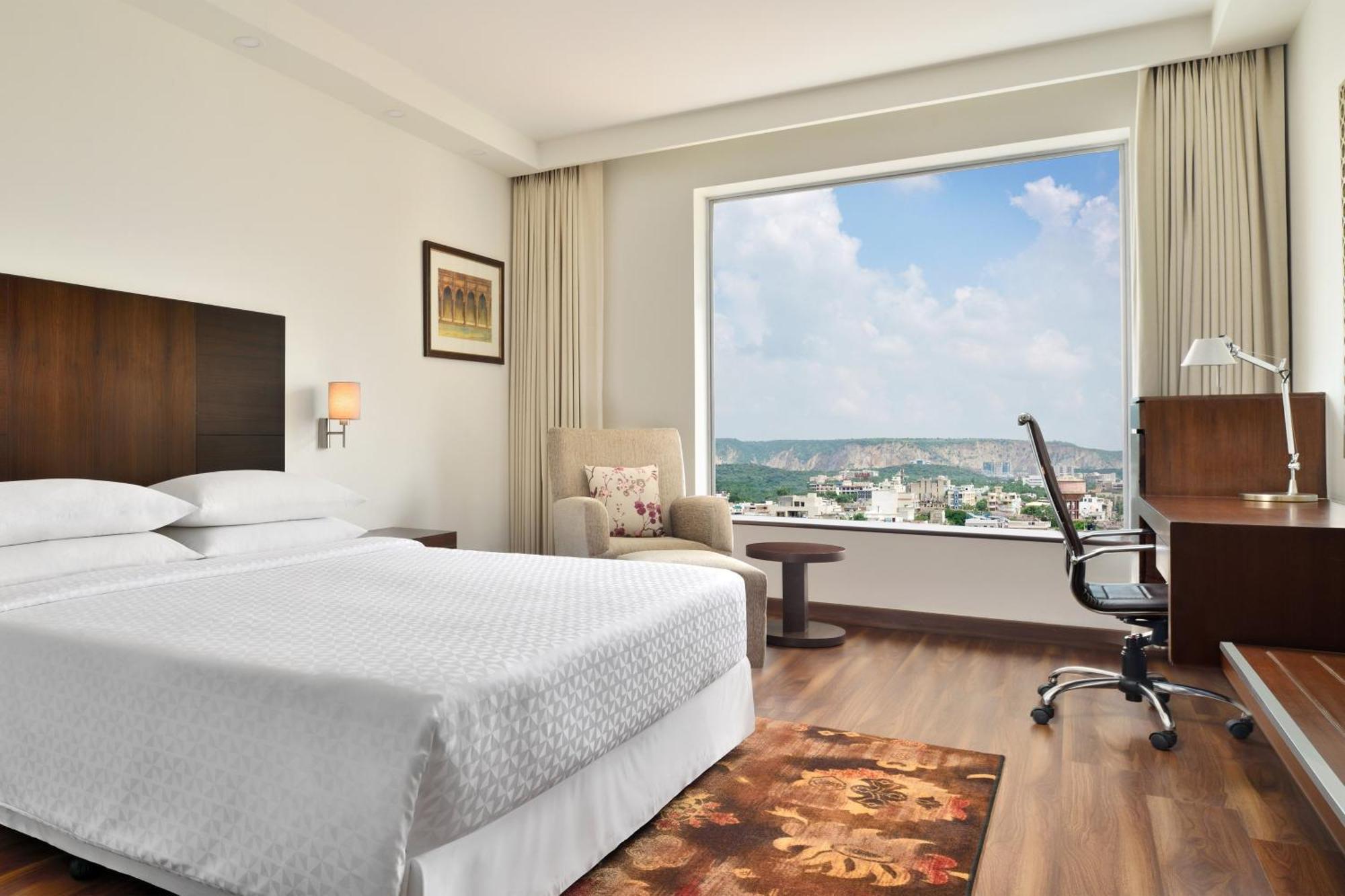 Club King Room Lounge Access Dis on SPA Laundry Food & Soft Beverages only at The Eatery One way Airport or Railway Transfer complimentaryCredit Meal of INR 1000 or a the on bill amount of INR 2500 or