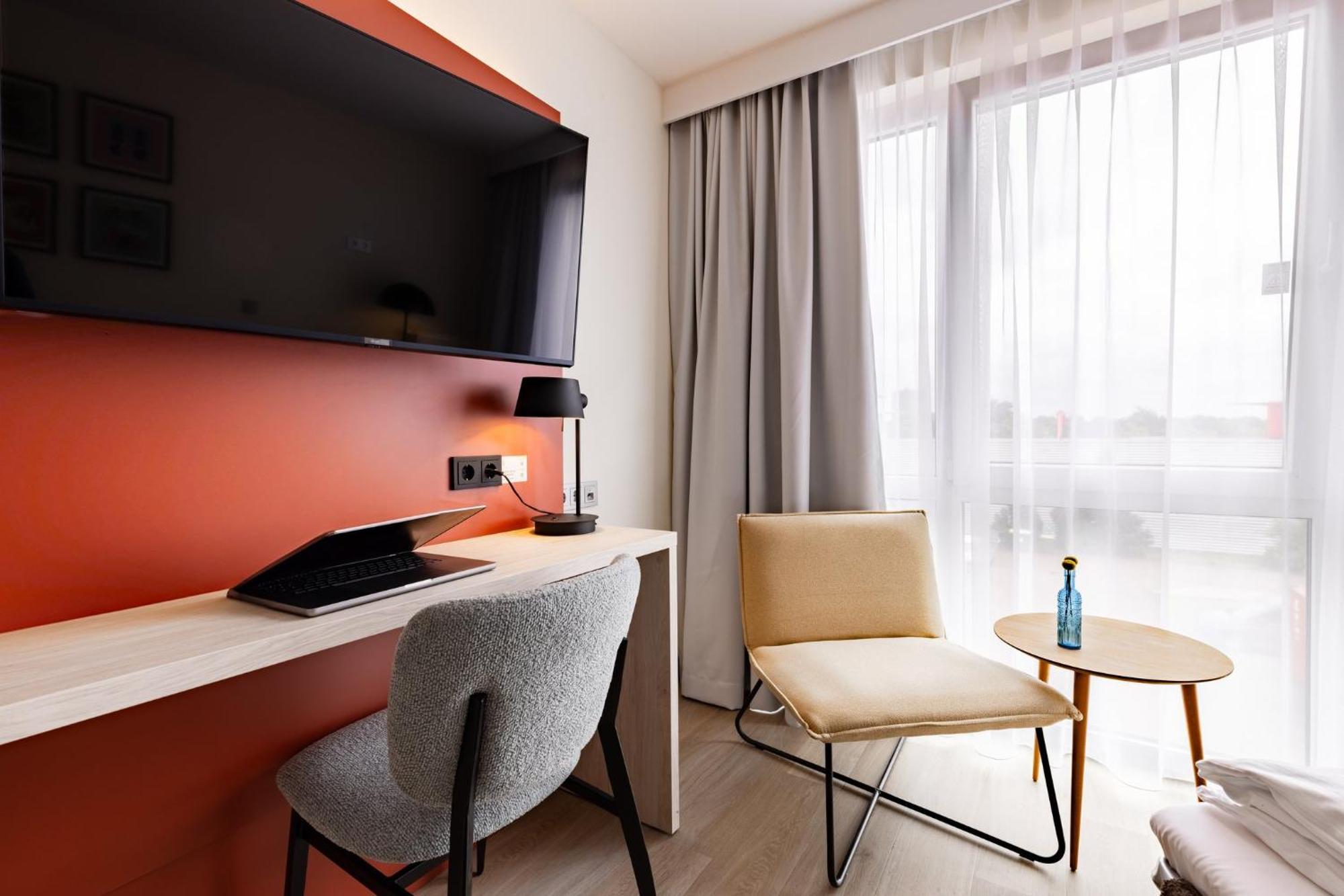 Premium Kamer met 1 Queensize Bed - Slaapbank
