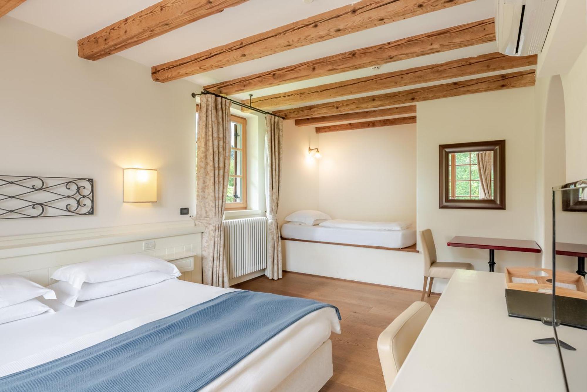 Deluxe Dreibettzimmer
