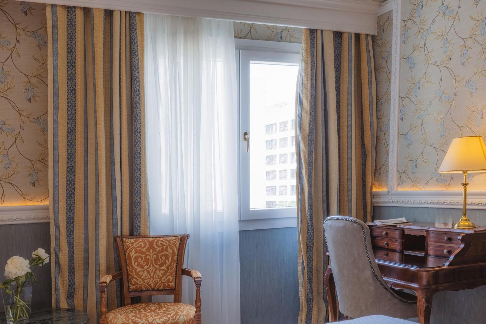 Deluxe City View with king bed, marble bathroom and wooden floor
