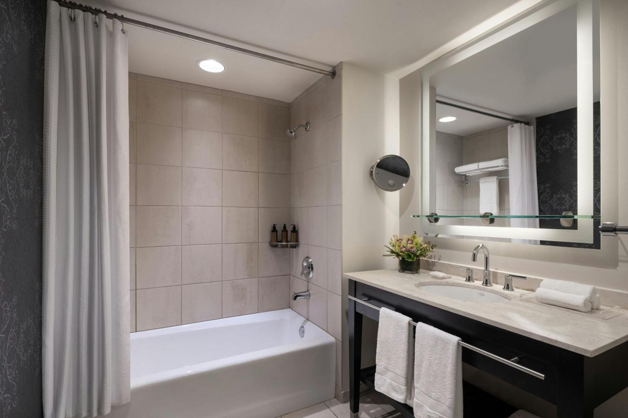 Premium Queen Room Roll Shower Mobility or Hearing Accessible