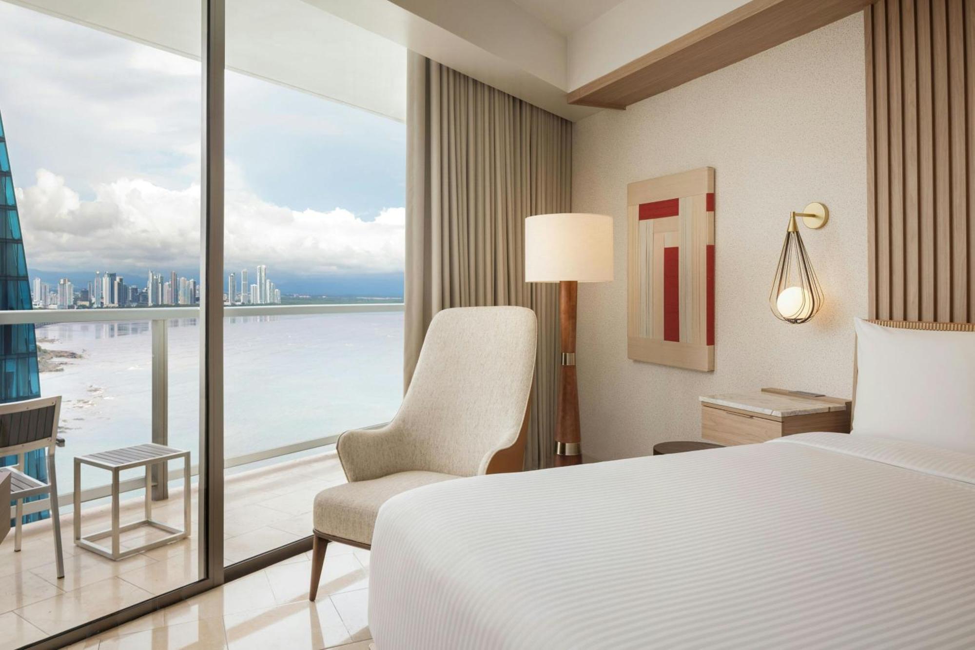 King Guest Room with Balcony - Partial Ocean View