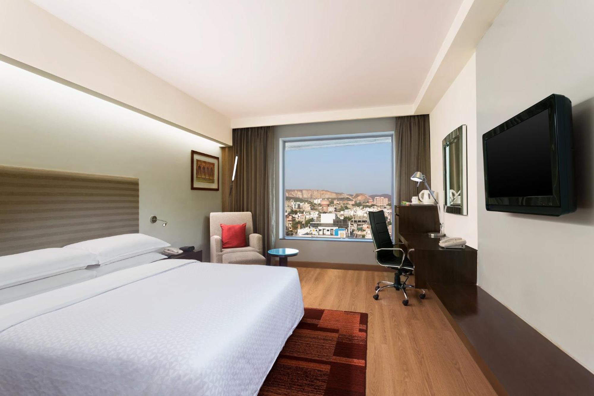 Deluxe King Guest Room Dis on SPA Laundry Food & Soft Beverages only at The Eatery Credit Meal of INR 1000 or a the on bill amount of INR 2500 or