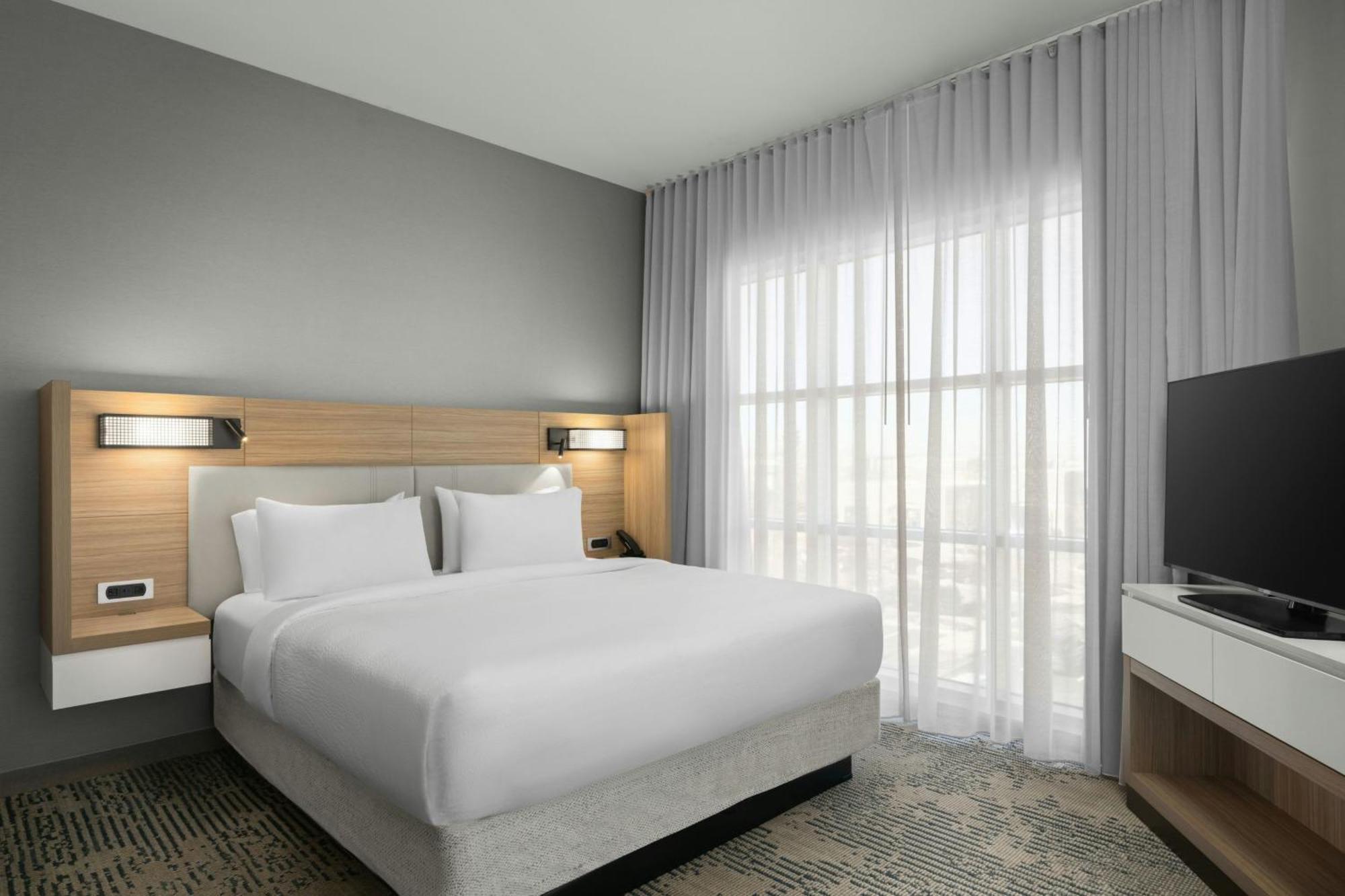 One-Bedroom King Suite with Sofa Bed and Roll-In Shower - Mobility and Hearing Accessible