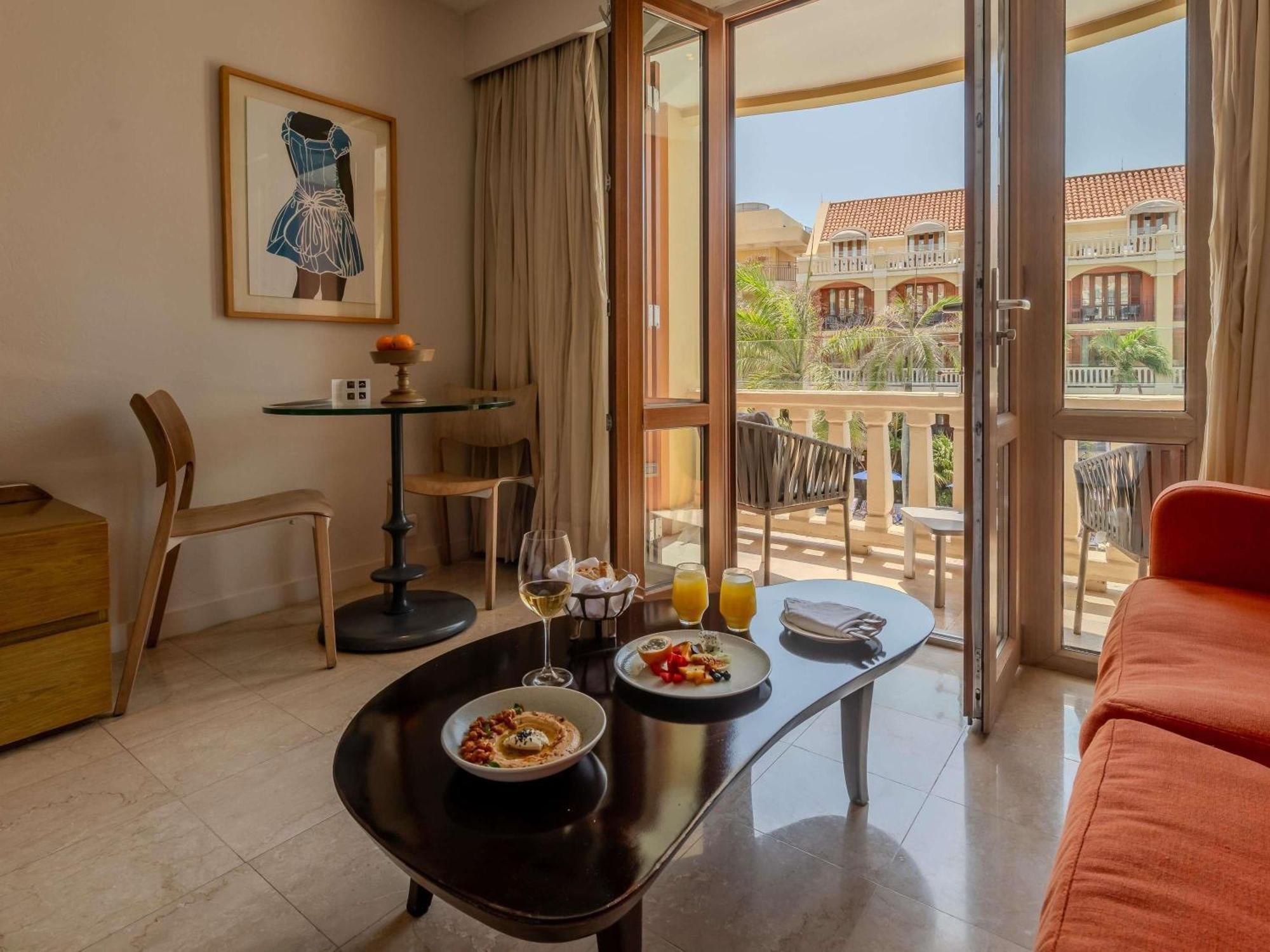 Superior King Room Balcony Pool View