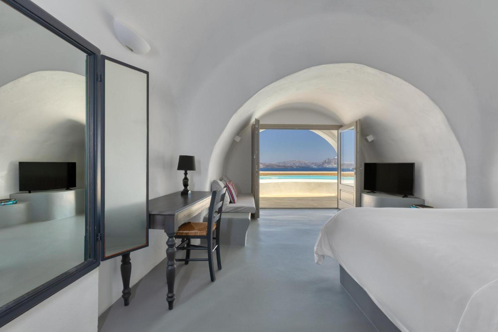 Hébergement Troglodyte Deluxe avec Piscine Privée - Vue sur Caldeira