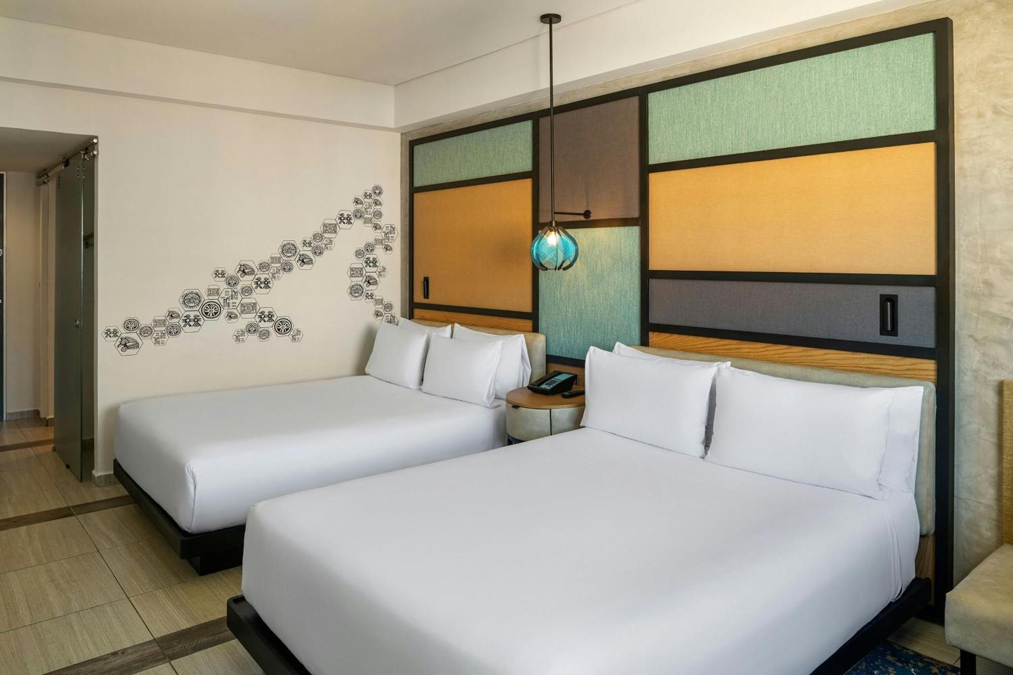Aloft Partial View Guest room 2 Queen Complimentary open bar