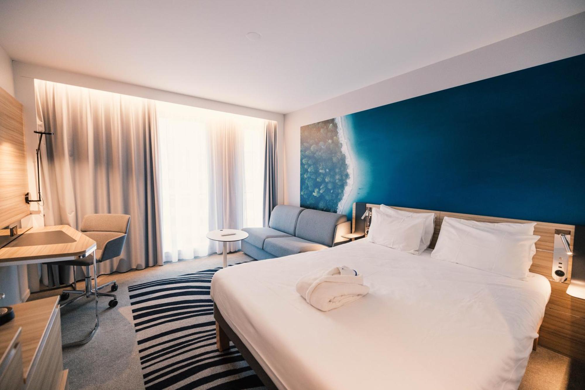 Chambre Exécutive avec 1 Lit Queen-Size et 1 Canapé