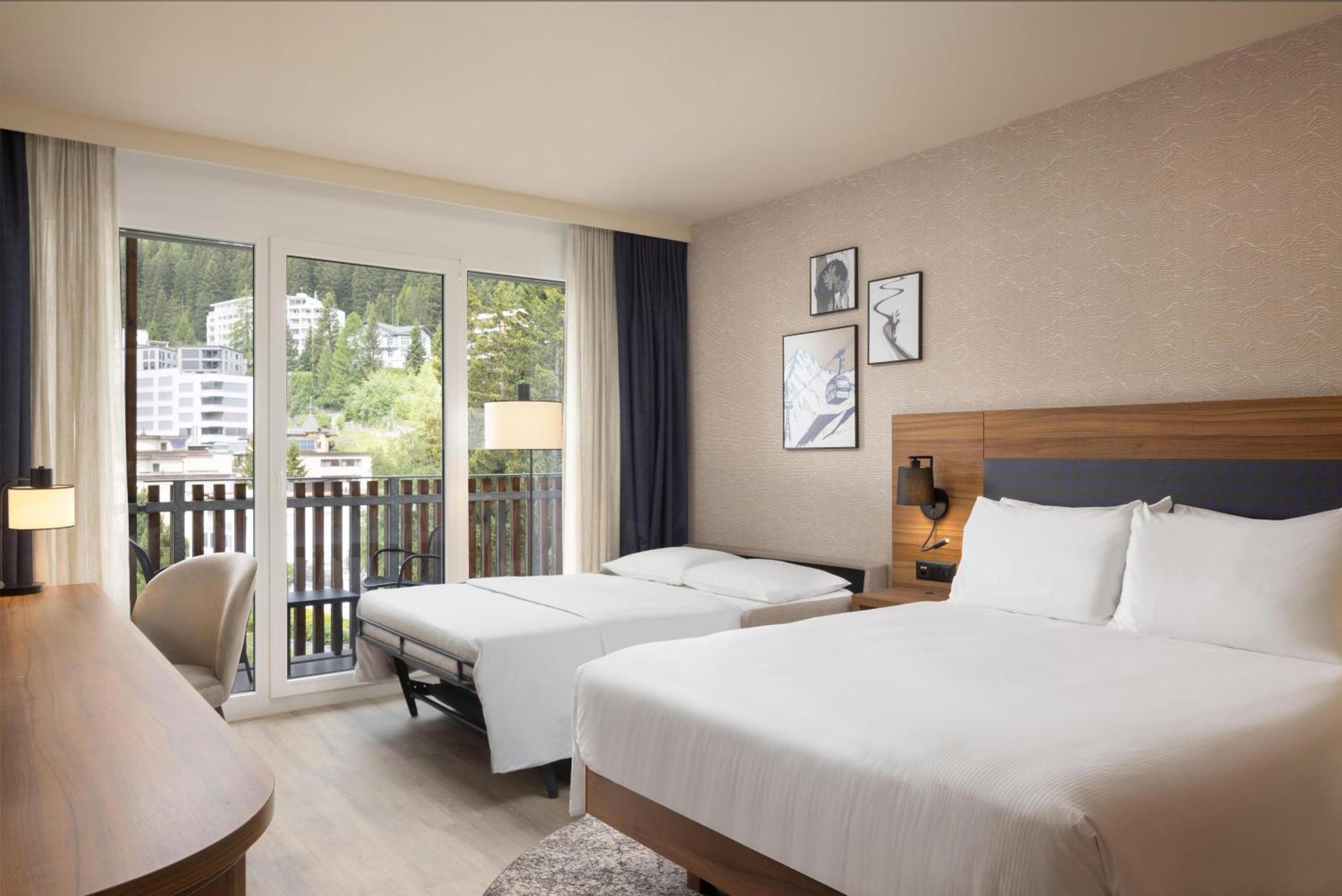 Familienzimmer mit Queensize-Bett und Schlafsofa