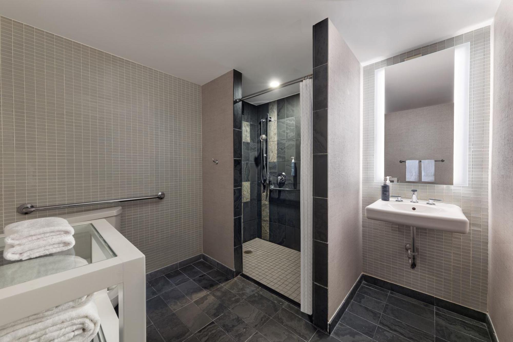 Traditional King Room Roll Shower Mobility Hearing Accessible