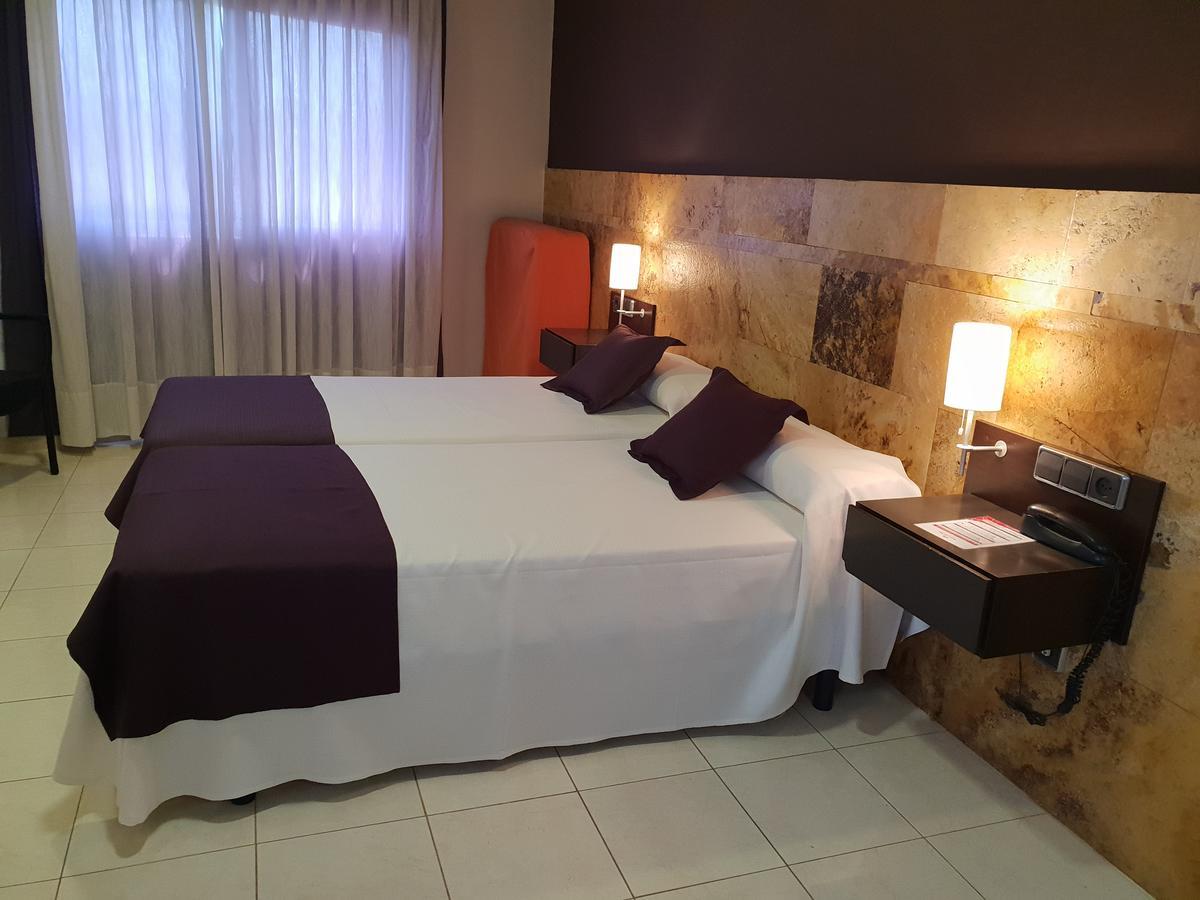 Triple Room (2 Adults + 1 Child)