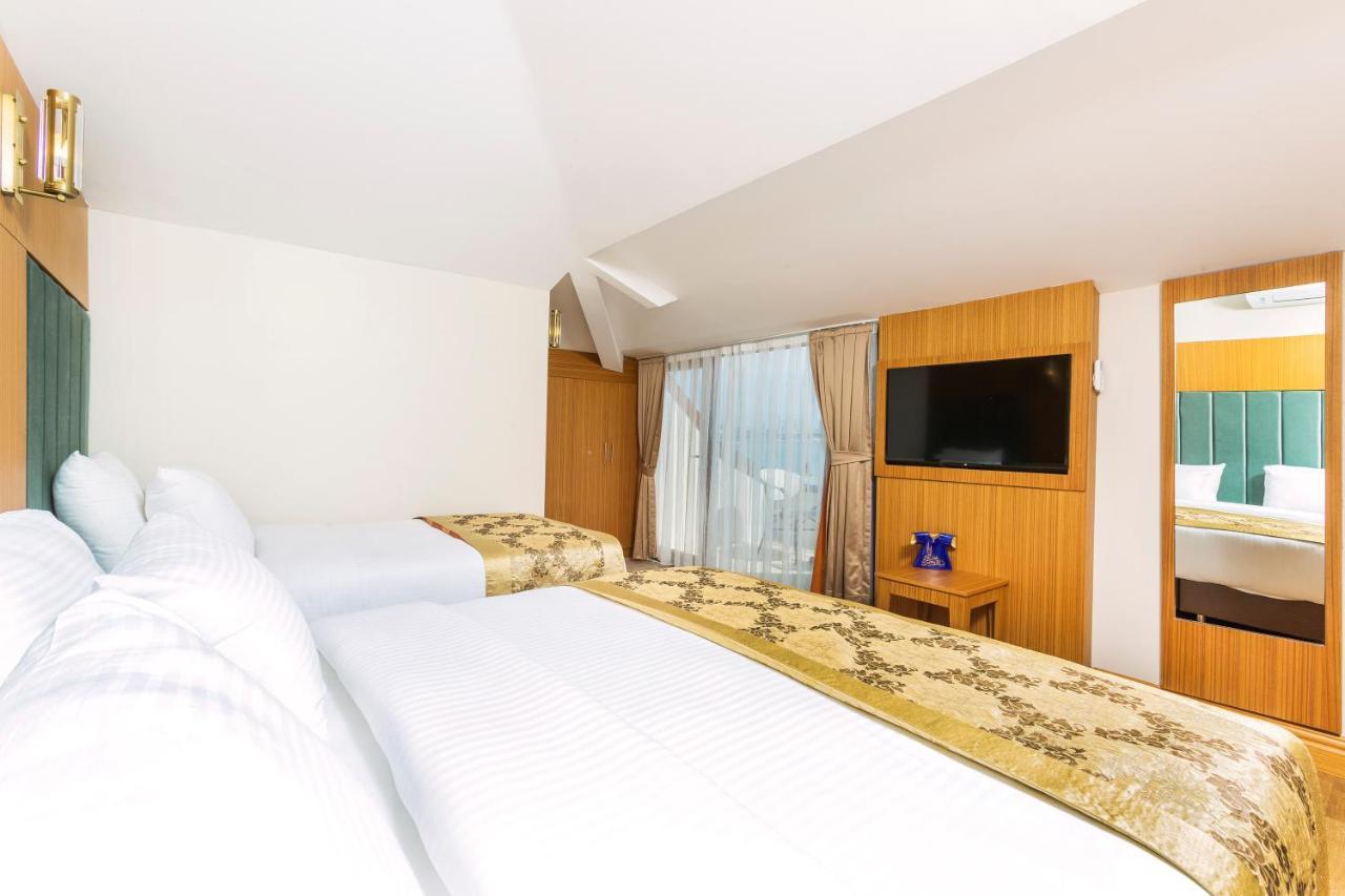 Superior Triple Room with Sea View,775666246:JPEG