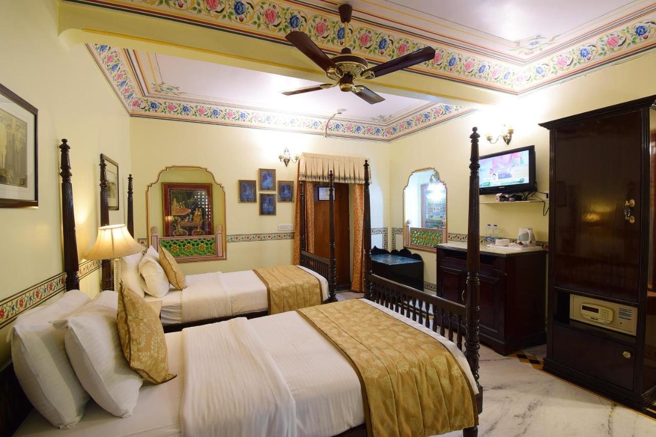 Royal Suite Family pickup on arrival from train or bus station Enjoy a daily Rajasthani dance & music show from 7–9 PM swimming pool a dedicated travel desk to assist local sightseeing tours intercity travel arrangements & activiti