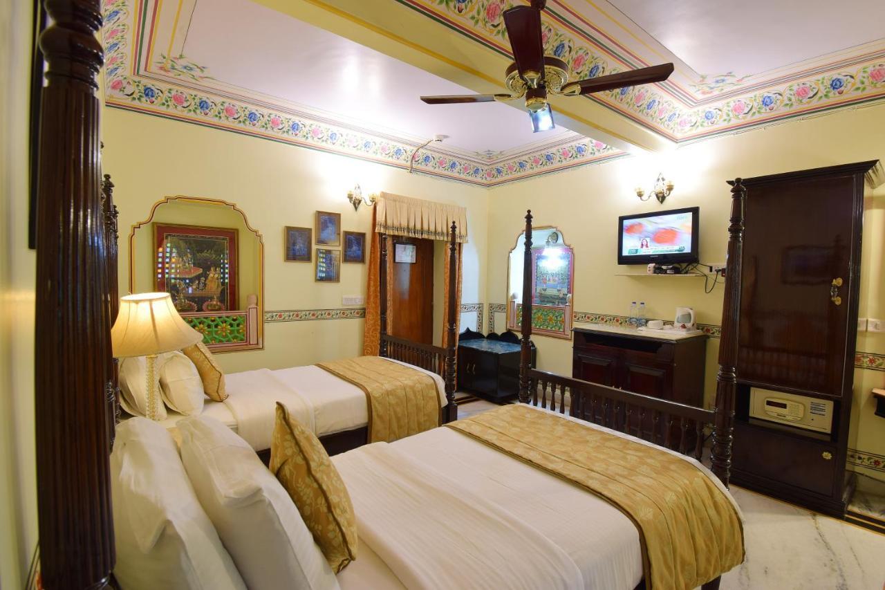 Royal Suite Family pickup on arrival from train or bus station Enjoy a daily Rajasthani dance & music show from 7–9 PM swimming pool a dedicated travel desk to assist local sightseeing tours intercity travel arrangements & activiti