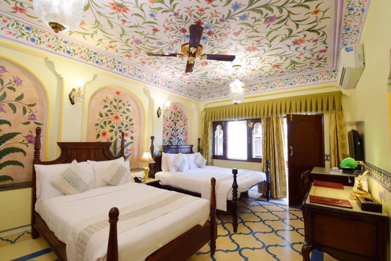 Royal Suite Family pickup on arrival from train or bus station Enjoy a daily Rajasthani dance & music show from 7–9 PM swimming pool a dedicated travel desk to assist local sightseeing tours intercity travel arrangements & activiti