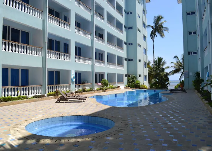 Cowrie Shell Beach Apartments Official