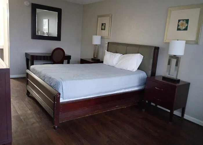 Apm Inn And Suites